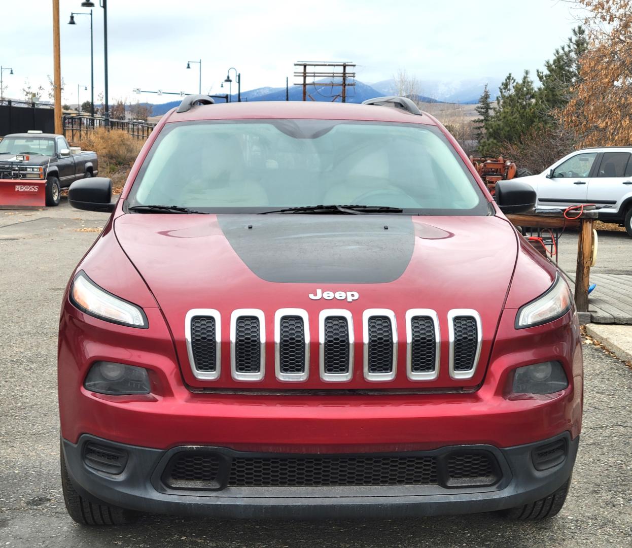 2016 Maroon /Tan Jeep Cherokee Sport (1C4PJMAB9GW) with an 2.4L I4 engine, 9 Speed Automatic transmission, located at 450 N Russell, Missoula, MT, 59801, (406) 543-6600, 46.874496, -114.017433 - Clean 4 Wheel Drive SUV. Air. Cruise. Tilt. Power Windows and Locks. Bluetooth. Backup Camera. - Photo#4